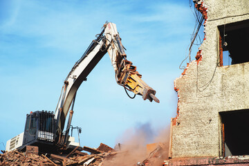 Demolishing an old industrial building. Renovation concept of old dilapidated housing.