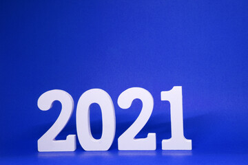 Happy new year 2021 , 2021 number wooden object on Blue background and copy space - Blue new year celebrate concept 
