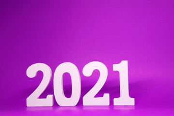 2021 number wood object on purple background and copy space - Happy new year 2021 - purple new year celebrate concept  - Countdown from 2020 to 2021