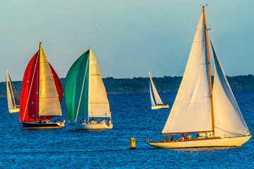 Fototapeta premium Evening Sailboats Racing Padanaram Harbor Dartmouth Massachusetts
