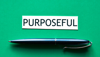 PURPOSEFUL - word on a green background with a black handle