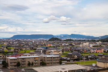 Fototapeta na wymiar Cityscape of Ayagawa town looking Yashima , Kagawa, Shikoku, Japan 