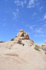 Fototapeta na wymiar Rock mountain made from sandstone in the desert with a beautiful blue sky