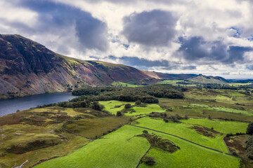 Beautiful drone view over Lake District landscape in late Summer, in Wast Water valley with mountain views and dramatic sky