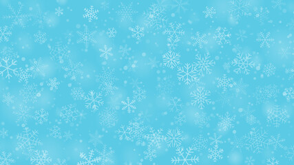 Christmas background of snowflakes of different shapes, sizes and transparency in light blue colors