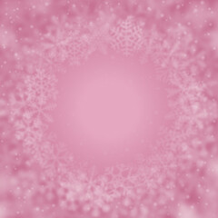 Christmas background of snowflakes of different shape, blur and transparency, arranged in a circle, on pink background