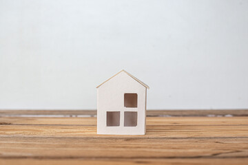 Obraz na płótnie Canvas Home protecting insurance concept ,Paper house, family home