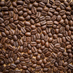 Naklejka premium Close up of roasted coffee beans background