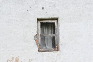 old wooden window on the abandoned house