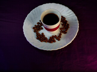 cup of coffee with beans