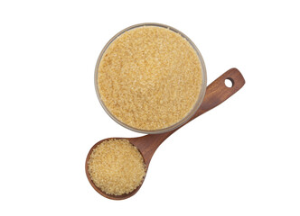 Top view of sugar in bowl and wooden spoon isolated on white background