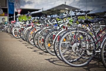 Bicycles in a row on parking
