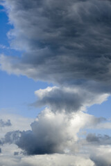 Dramatic panoramic skyscape with dark stormy clouds