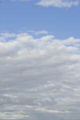 White clouds cumulus floating on blue sky for backgrounds concept
