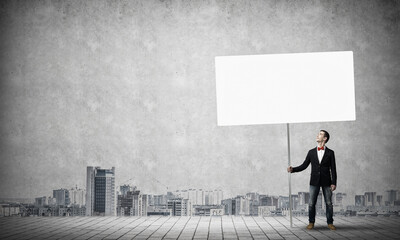 Guy with white billboard