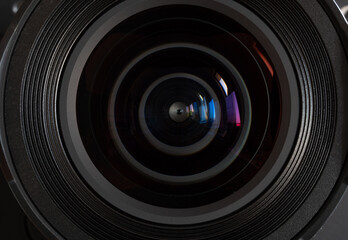 Close-up camera lens with color reflections