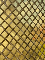 Fototapeta premium Temple walls gold tiles full frame close up detail
