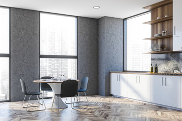 White and gray kitchen corner with dining table