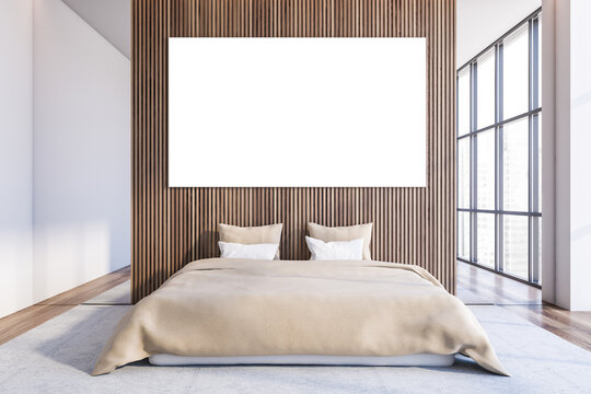 Modern white and dark wooden master bedroom with poster
