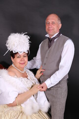 Retro. Married couple. Costumes of the 18th century. Studio shooting.