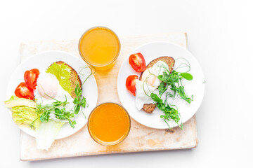 Fototapeta na wymiar Top view of healthy breakfast with poached eggs