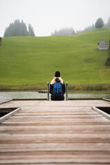 Girl sitting on  a dock