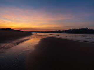 Sunset on the beach of the bay in Santander