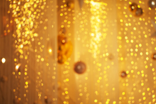 Golden bokeh background. Abstract Christmas glitter holiday glowing backdrop blurry background