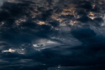 Naklejka na ściany i meble Black clouds in the sky before the rain