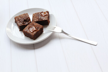 Homemade brownies with milk chocolate chunks on top