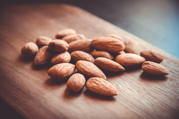Almonds on a wooden cutting board
