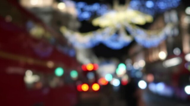 Slow motion blurred background of London festive Christmas street lights and decorations