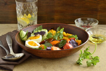 Corn salad with vegetables and boiled egg