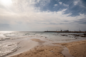 Sandy seashore against the sky
