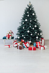 Christmas tree pine with gifts interior decor new year winter holiday