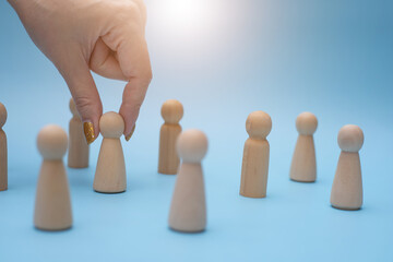 Successful team leader, Woman hand choose people standing out from the other.