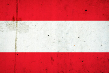 Austria flag on a concrete wall. Europe.