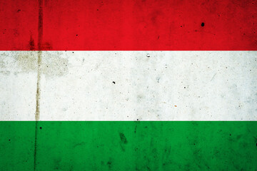 Hungary flag on a concrete wall. Europe.