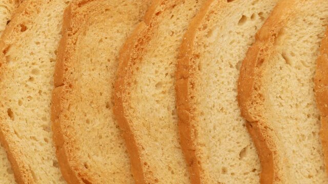 Rusks, dolly shot. Pieces of bread with crust.