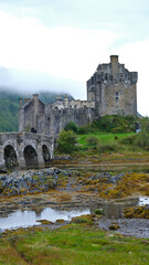 A foggy autumn morning at Eilean Donan Castle in Scotland