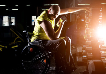 Disabled man training in the gym of rehabilitation center
