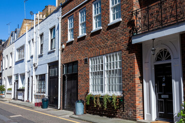 Mews house residential apartments in Marylebone London England UK which are converted buildings...
