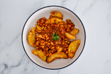 plant-based food, potato wedges with baked beans