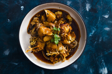 plant-based food, vegan potato bake with spanish onions and dairy-free cream cheese