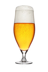 Glass of light yellow beer isolated on white.
