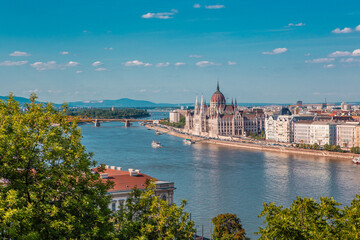 Obraz premium The Parliament building of Hungary in Budapest, along the Danube river.
