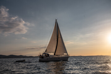 Fototapeta na wymiar A vintage sailboat at the coast of Zadar, in Croatia.