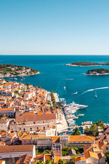 The old harbour at Hvar island, at the coast of Croatia, on a sunny day, summer time.