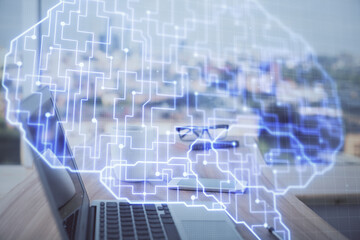 Multi exposure of work space with computer and human brain hologram. Brainstorm concept.