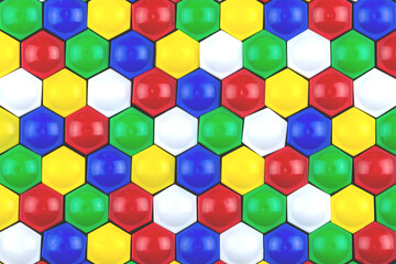 Multicolored plastic hexagonal children's mosaic as a background, texture, pettern.